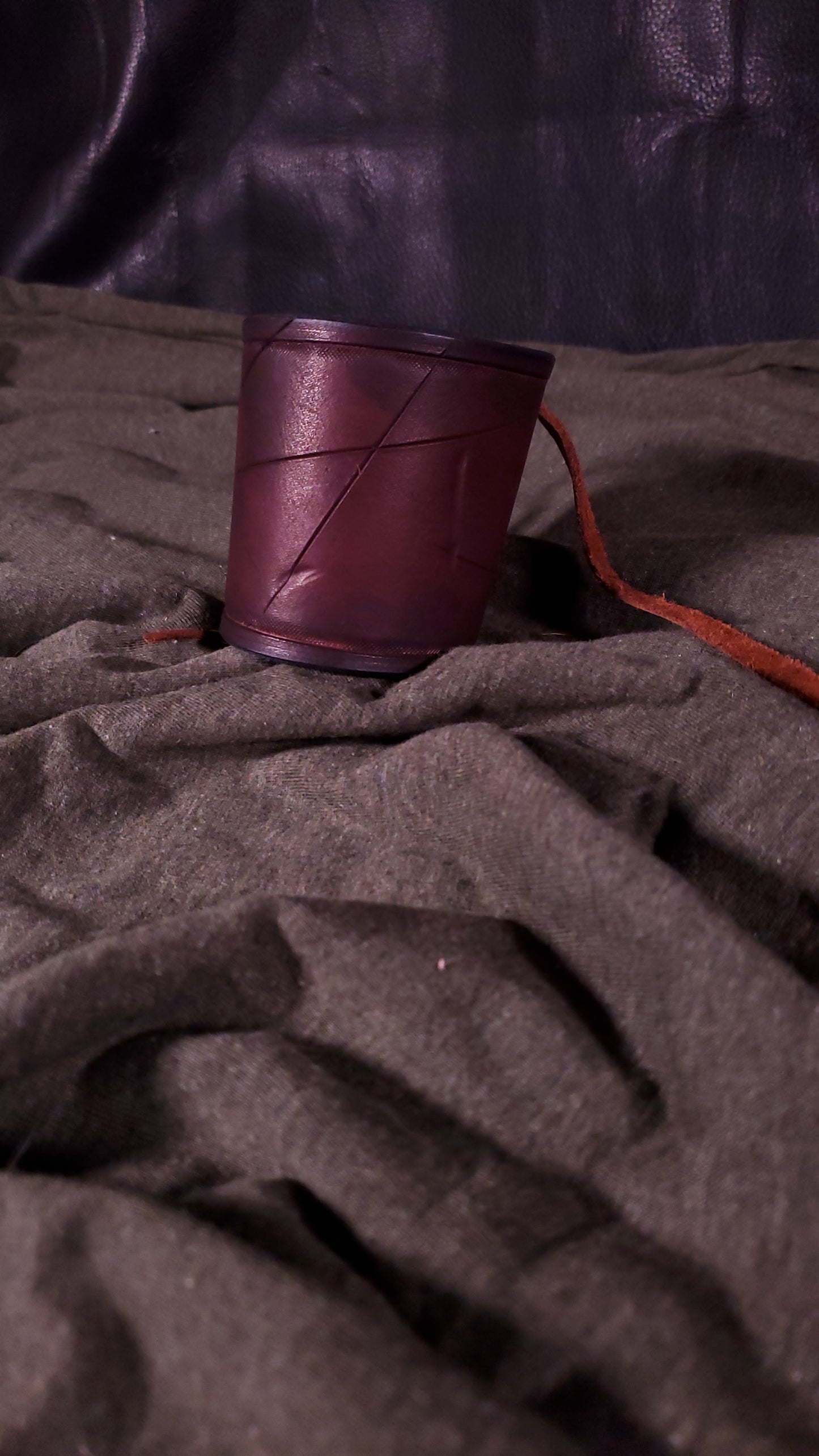 Red large cuff with laces and battle damage