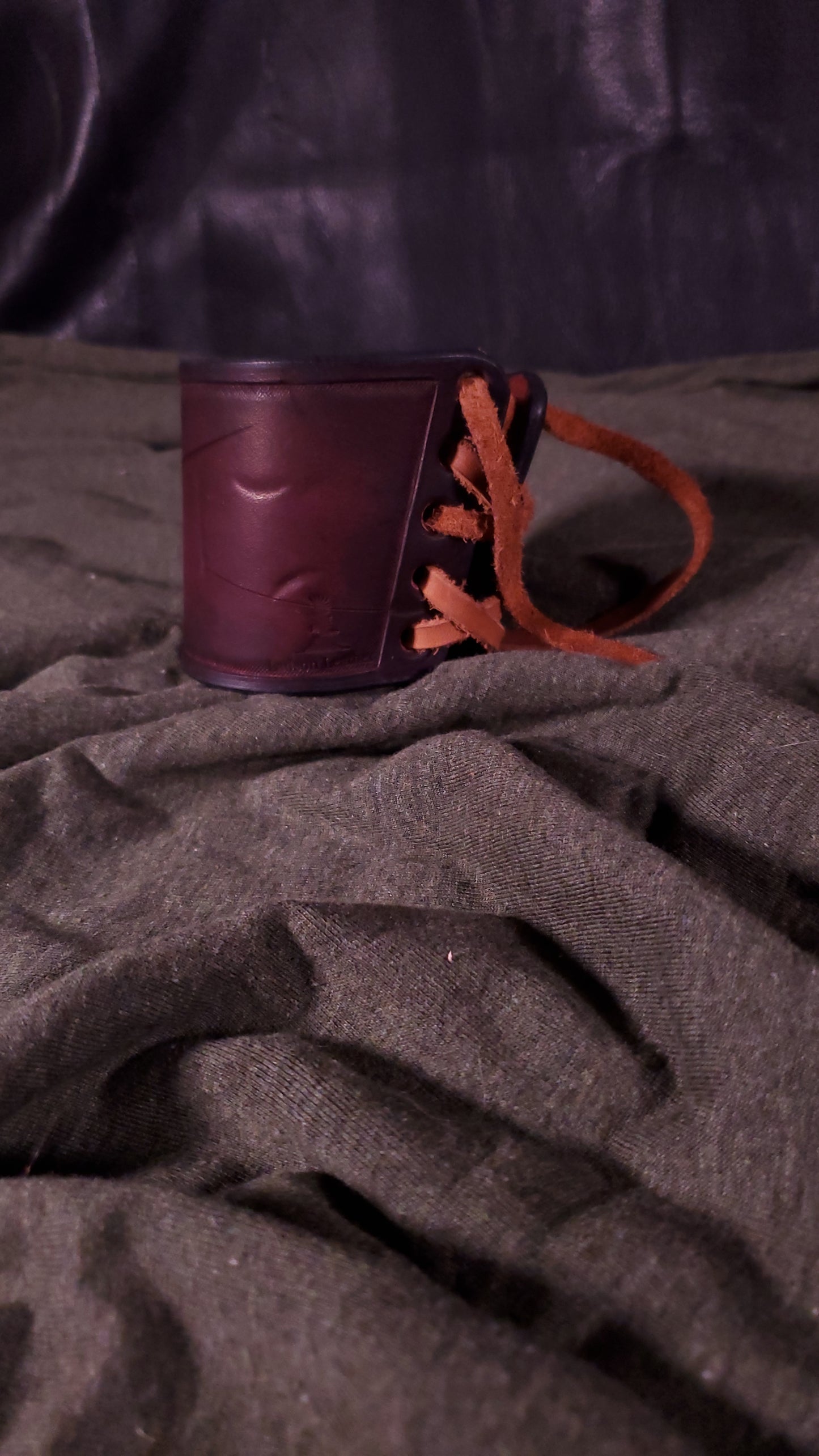 Red large cuff with laces and battle damage